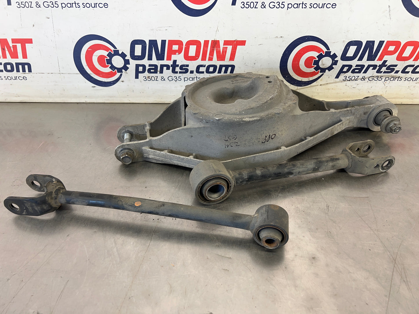 2008 Infiniti G37 Driver Left Rear Lower Control Arms and Spring Bucket OEM 21BAXDG - On Point Parts Inc