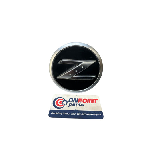 03-09 Nissan 350Z OEM Front Fender Emblem Driver Passenger 63890CD000 - On Point Parts Inc