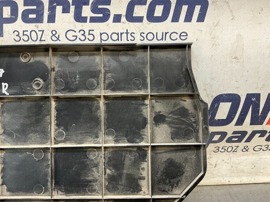03-09 Nissan 350Z Passenger Front Lower Kick Panel Trim 66900CD000 OEM 15BDBF7