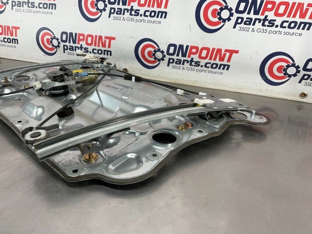 2004 Nissan 350Z Driver Left Window Regulator Motor Assembly 80731 OEM 25BF9E3 - On Point Parts Inc