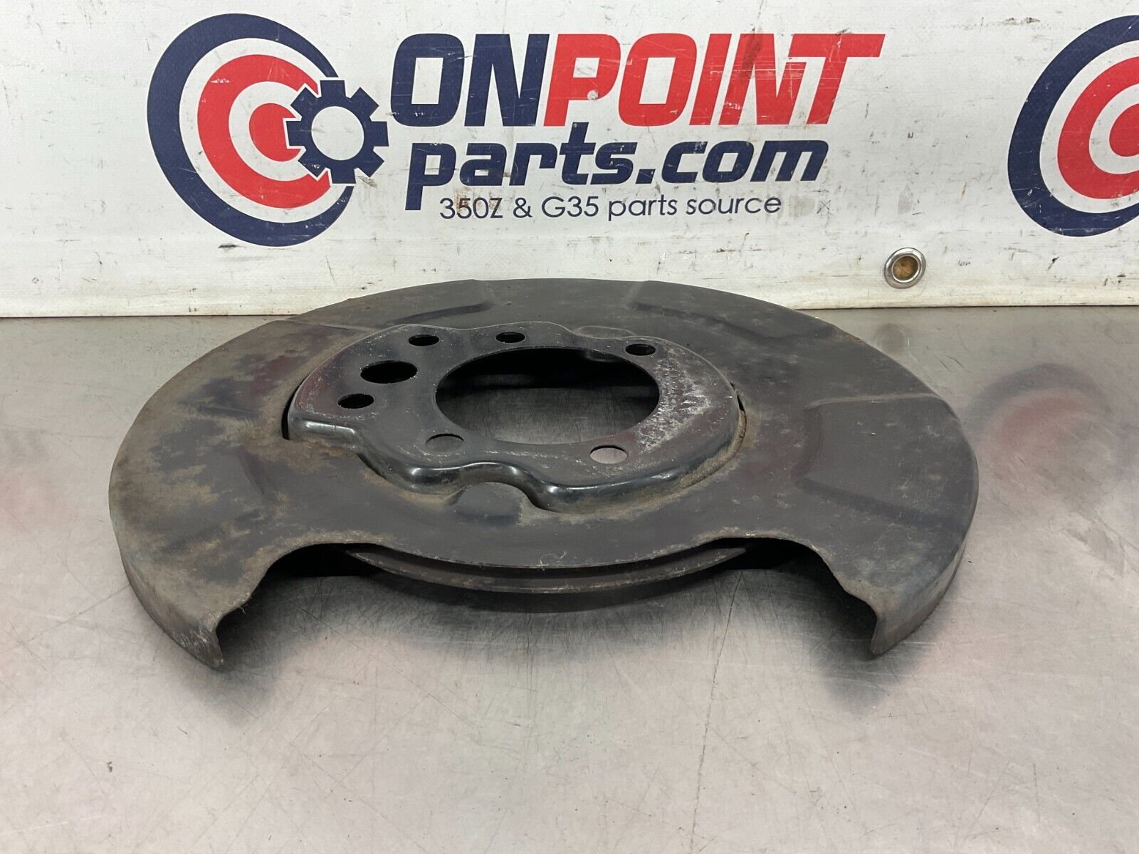 2004 Nissan 350Z Driver Left Rear Brake Dust Cover Baffle Plate OEM 25BF9EG - On Point Parts Inc