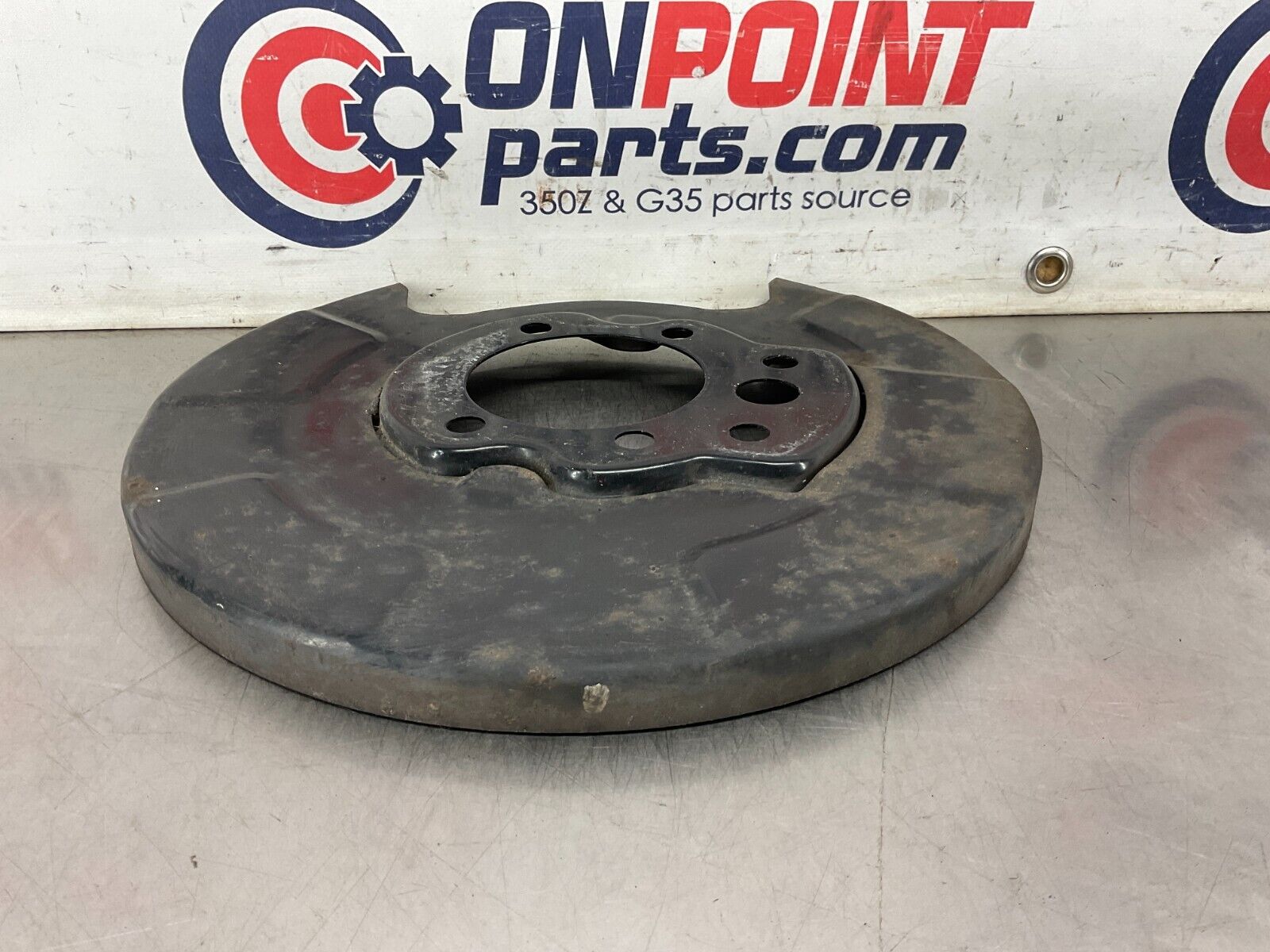 2004 Nissan 350Z Driver Left Rear Brake Dust Cover Baffle Plate OEM 25BF9EG - On Point Parts Inc
