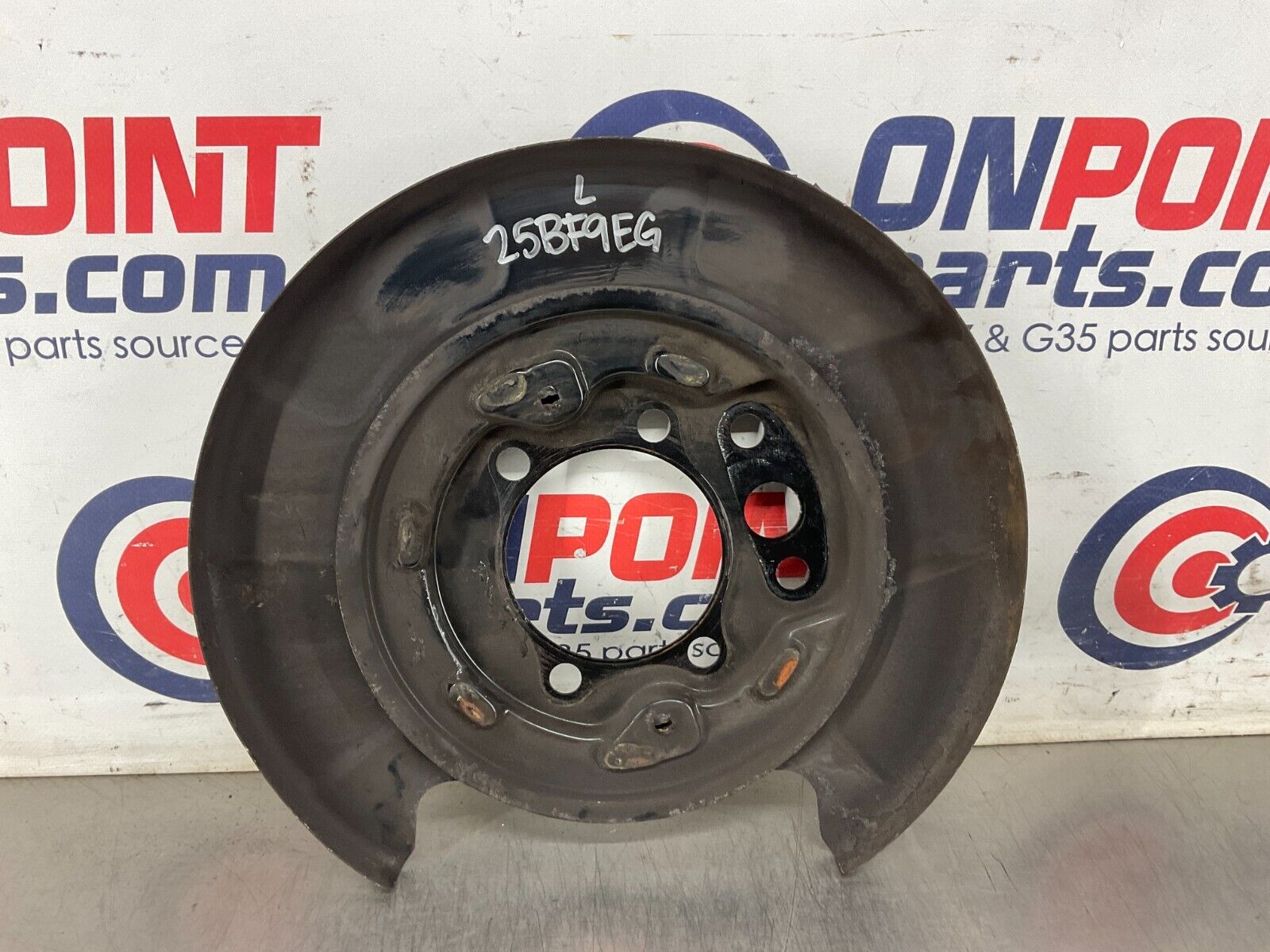 2004 Nissan 350Z Driver Left Rear Brake Dust Cover Baffle Plate OEM 25BF9EG - On Point Parts Inc