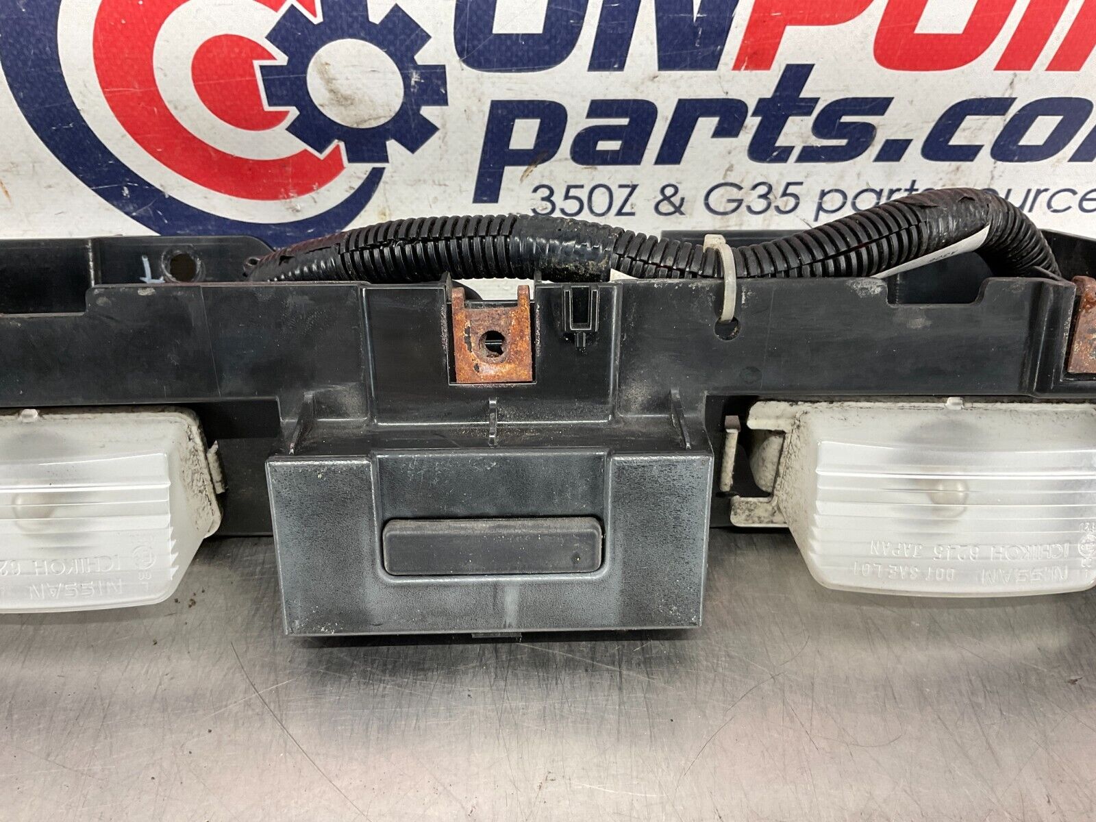 2004 Nissan 350Z Rear Bumper License Plate Light Assembly 96250 OEM 25BF9EC - On Point Parts Inc