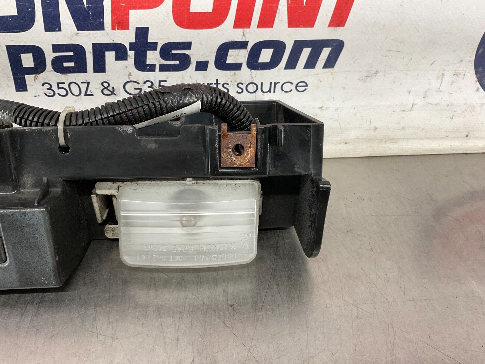 2004 Nissan 350Z Rear Bumper License Plate Light Assembly 96250 OEM 25BF9EC - On Point Parts Inc