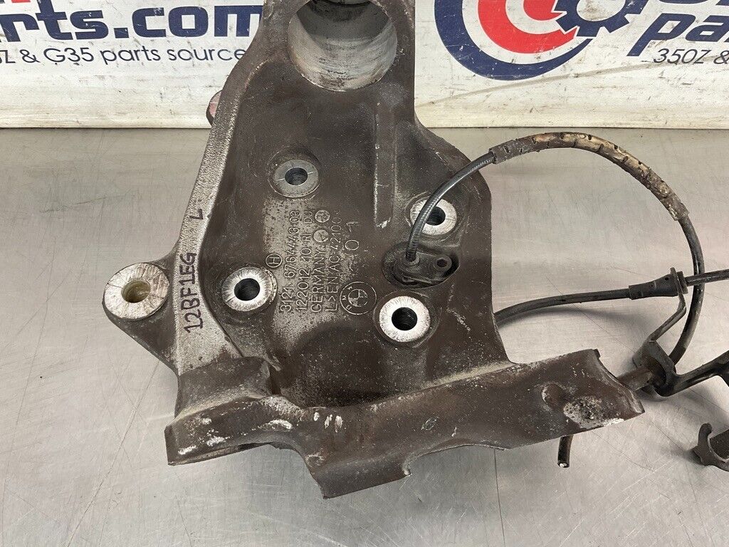 2006 BMW E90 Driver Left Front Steering Spindle Knuckle Axle Housing OEM 12BF1EG - On Point Parts Inc