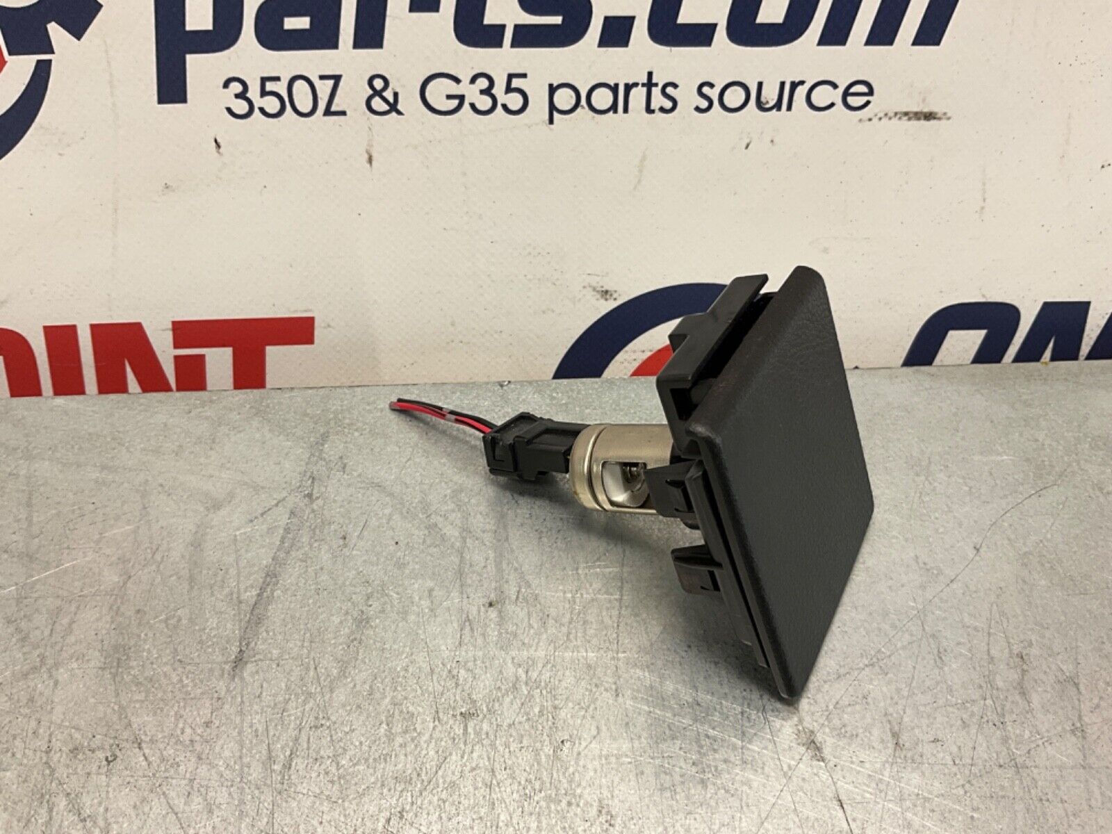 2005 Nissan Z33 350Z Rear Cigarette Lighter Power Supply OEM 24BHQEC – On  Point Parts Inc