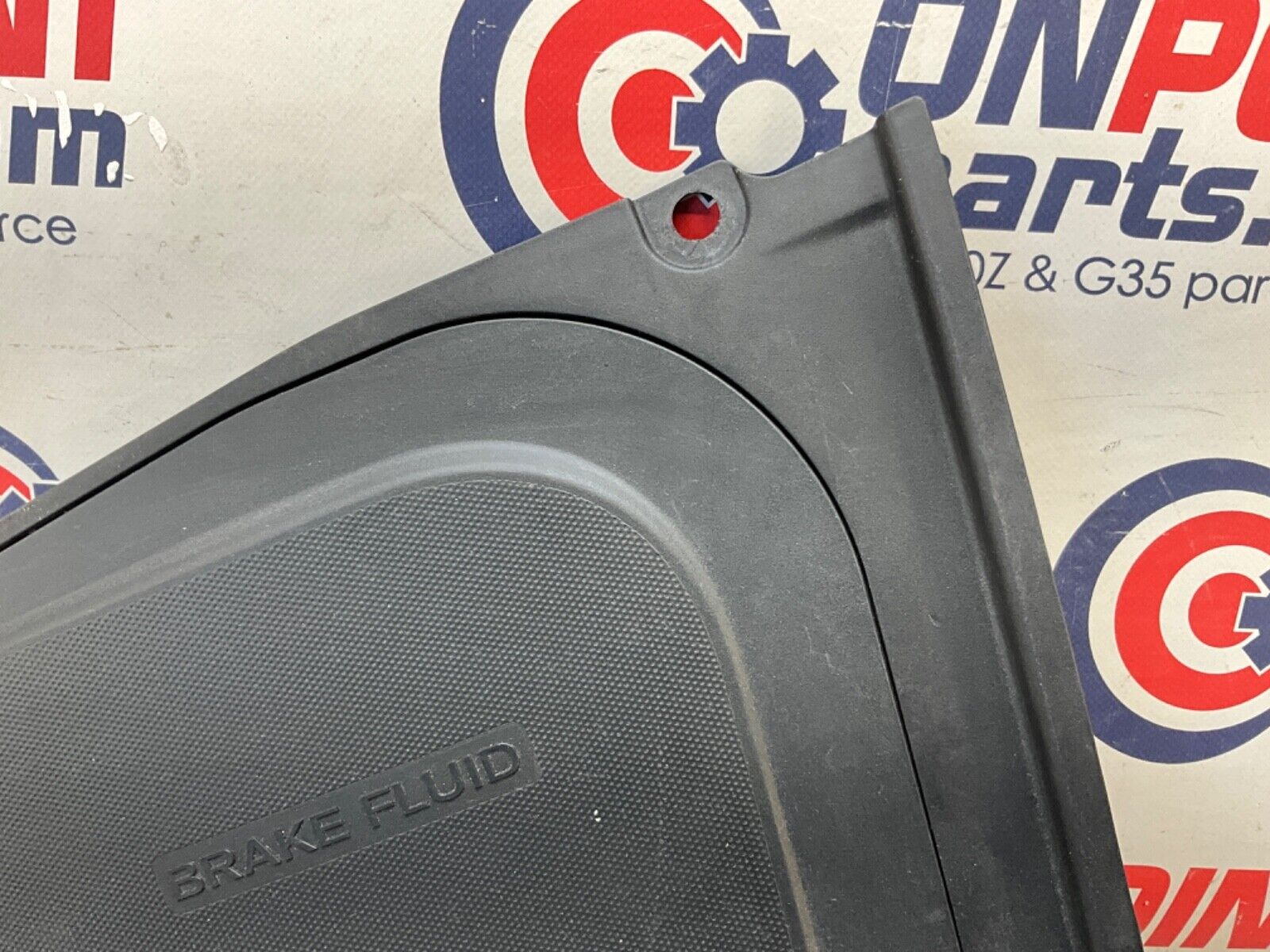 2014 Nissan Z34 370Z Driver Left Front Brake Fluid Cover Bezel Trim OEM 14BILE2 - On Point Parts Inc