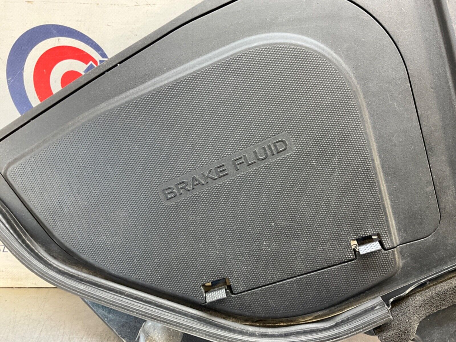 2014 Nissan Z34 370Z Driver Left Front Brake Fluid Cover Bezel Trim OEM 14BILE2 - On Point Parts Inc