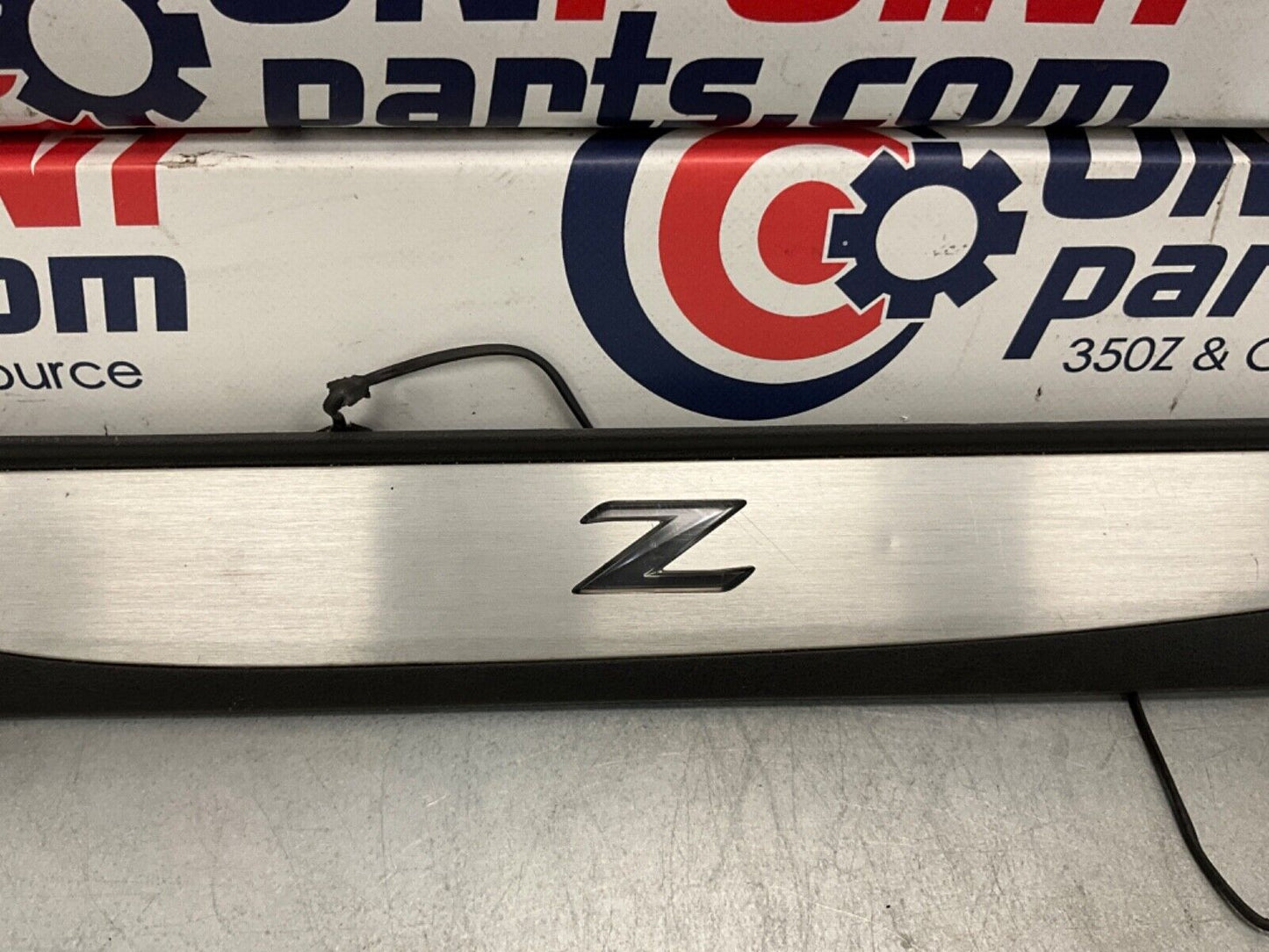 2014 Nissan 370Z Passenger Right Door Sill Illuminated Kick Plate OEM 14BILE7 - On Point Parts Inc