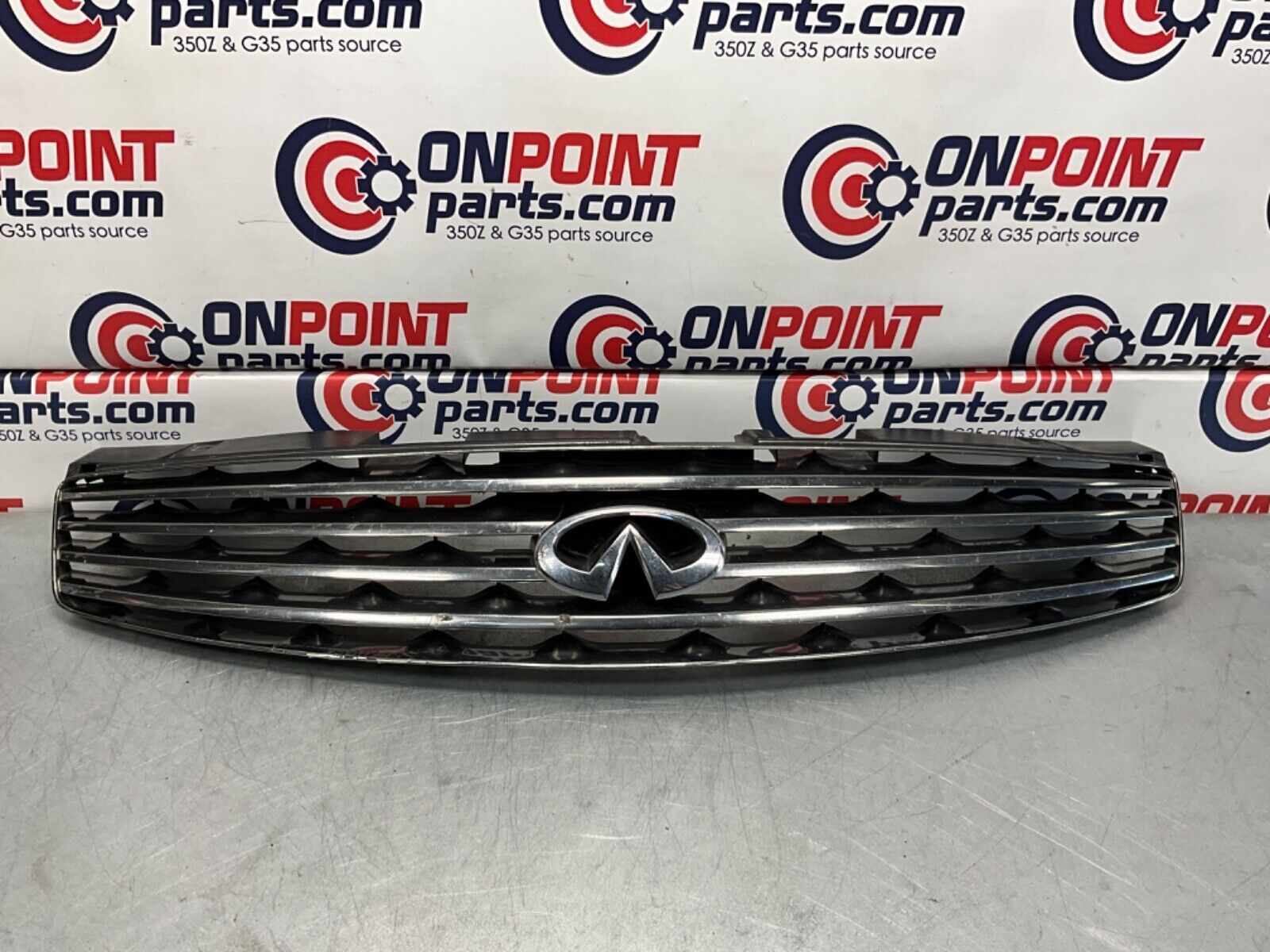 2005 Infiniti V35 G35 Coupe Front Bumper Grille with Emblem OEM 13BJXE2 - On Point Parts Inc