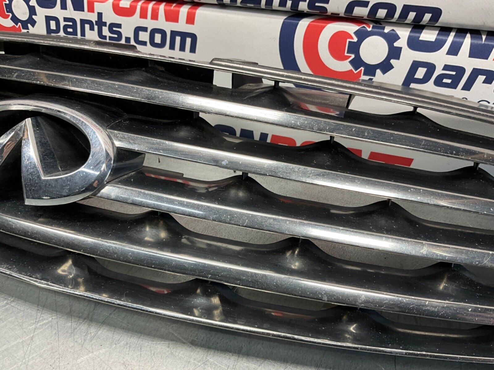 2005 Infiniti V35 G35 Coupe Front Bumper Grille with Emblem OEM 13BJXE2 - On Point Parts Inc