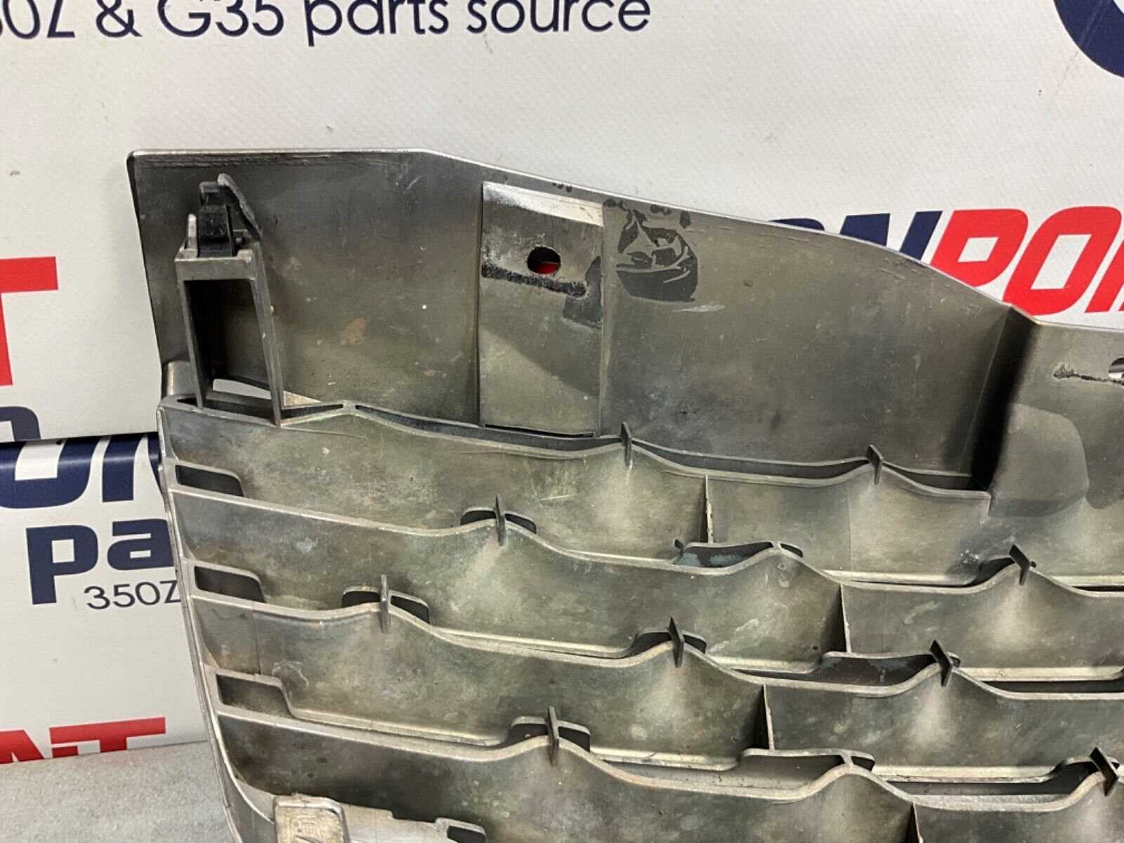 2005 Infiniti V35 G35 Coupe Front Bumper Grille with Emblem OEM 13BJXE2 - On Point Parts Inc