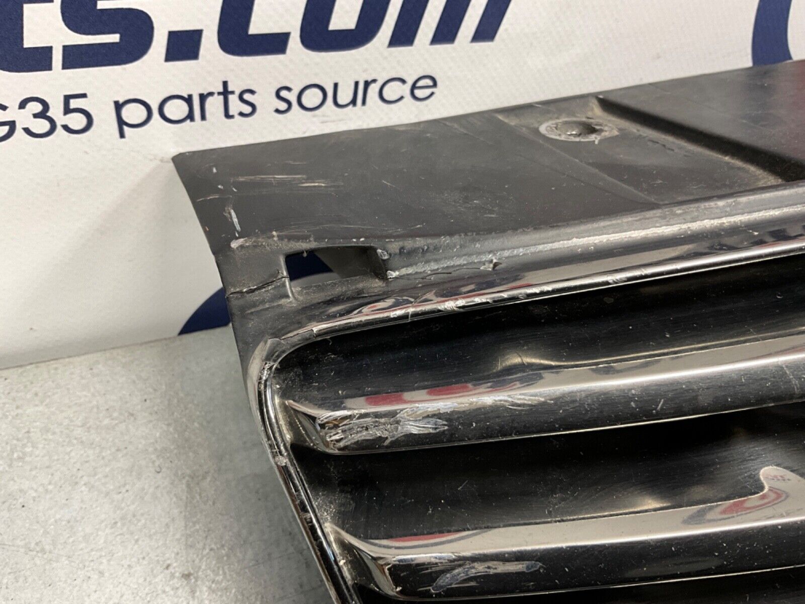 2005 Infiniti V35 G35 Coupe Front Bumper Grille with Emblem OEM 13BJXE2 - On Point Parts Inc