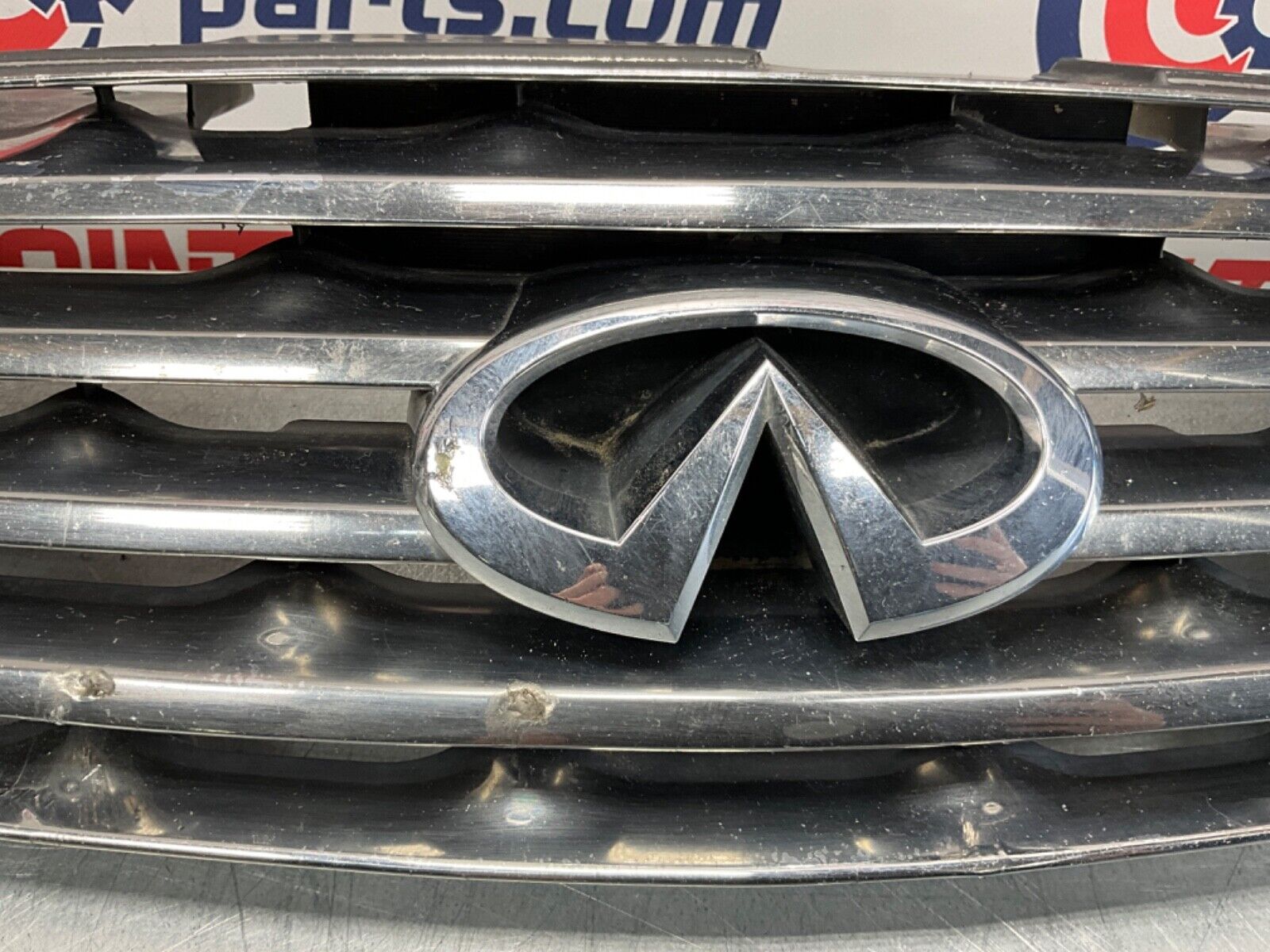 2005 Infiniti V35 G35 Coupe Front Bumper Grille with Emblem OEM 13BJXE2 - On Point Parts Inc