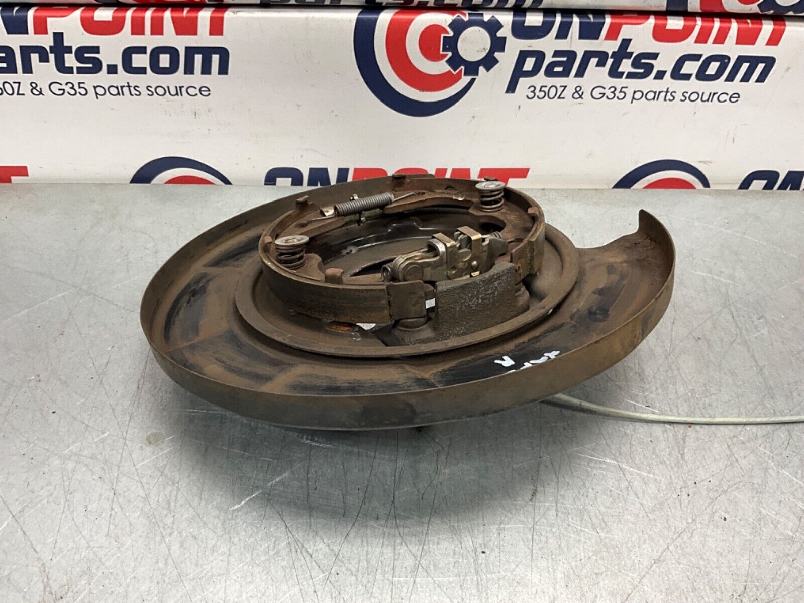 2004 Nissan Z33 350Z Passenger Right Rear Brake Dust Cover E Brake OEM 22BLCFK - On Point Parts Inc