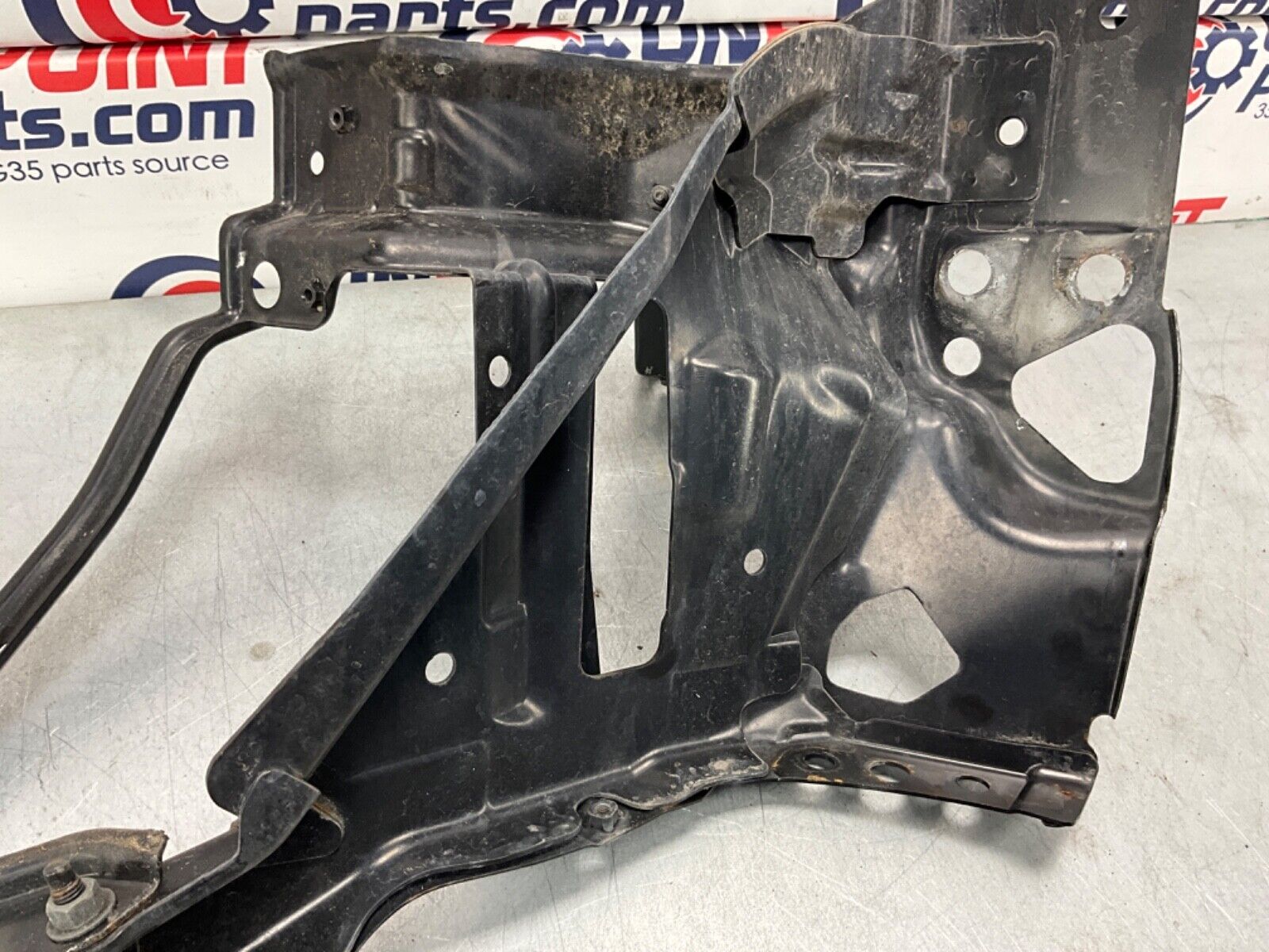 2004 Nissan Z33 350Z Passenger Right Headlight Bracket Basket OEM 22BLCF3 - On Point Parts Inc