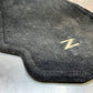 2004 Nissan 350Z Passenger Right Interior Carpet Floor Mat Z Logo OEM 22BLCF9 - On Point Parts Inc