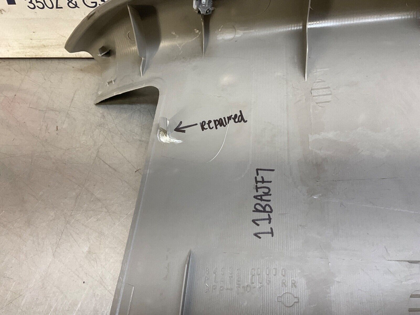 2004 Nissan Z33 350Z Trunk Latch Cover Panel OEM 11BAJF7 - On Point Parts Inc