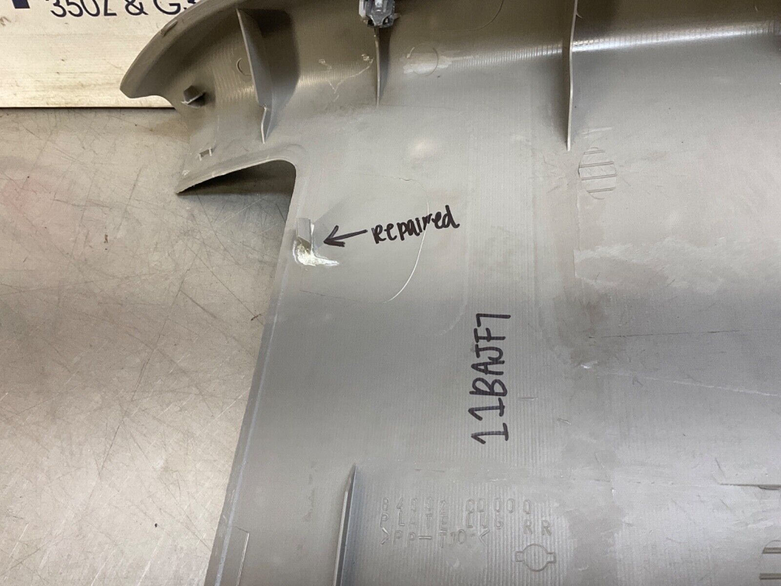 2004 Nissan Z33 350Z Trunk Latch Cover Panel OEM 11BAJF7 - On Point Parts Inc