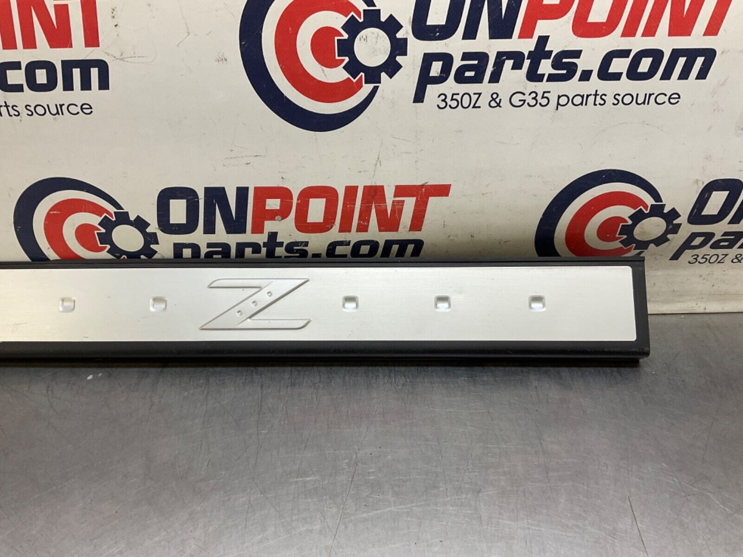 2004 Nissan Z33 350Z Passenger Right Door Threshold Kickplate Trim  OEM 14BALF7 - On Point Parts Inc