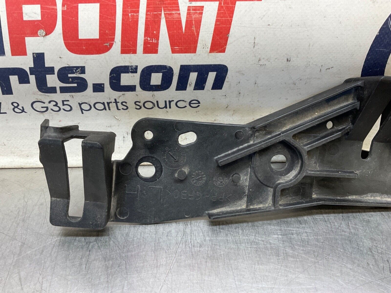 2009Infiniti V36 G37 Driver Left Radiator Support Headlight Bracket  OEM 12BAWFG - On Point Parts Inc