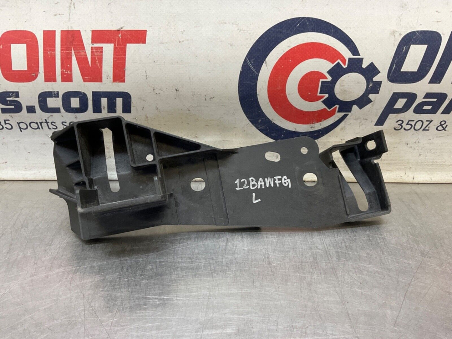 2009Infiniti V36 G37 Driver Left Radiator Support Headlight Bracket  OEM 12BAWFG - On Point Parts Inc