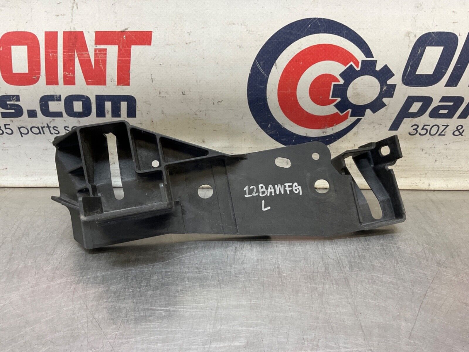 2009Infiniti V36 G37 Driver Left Radiator Support Headlight Bracket  OEM 12BAWFG - On Point Parts Inc