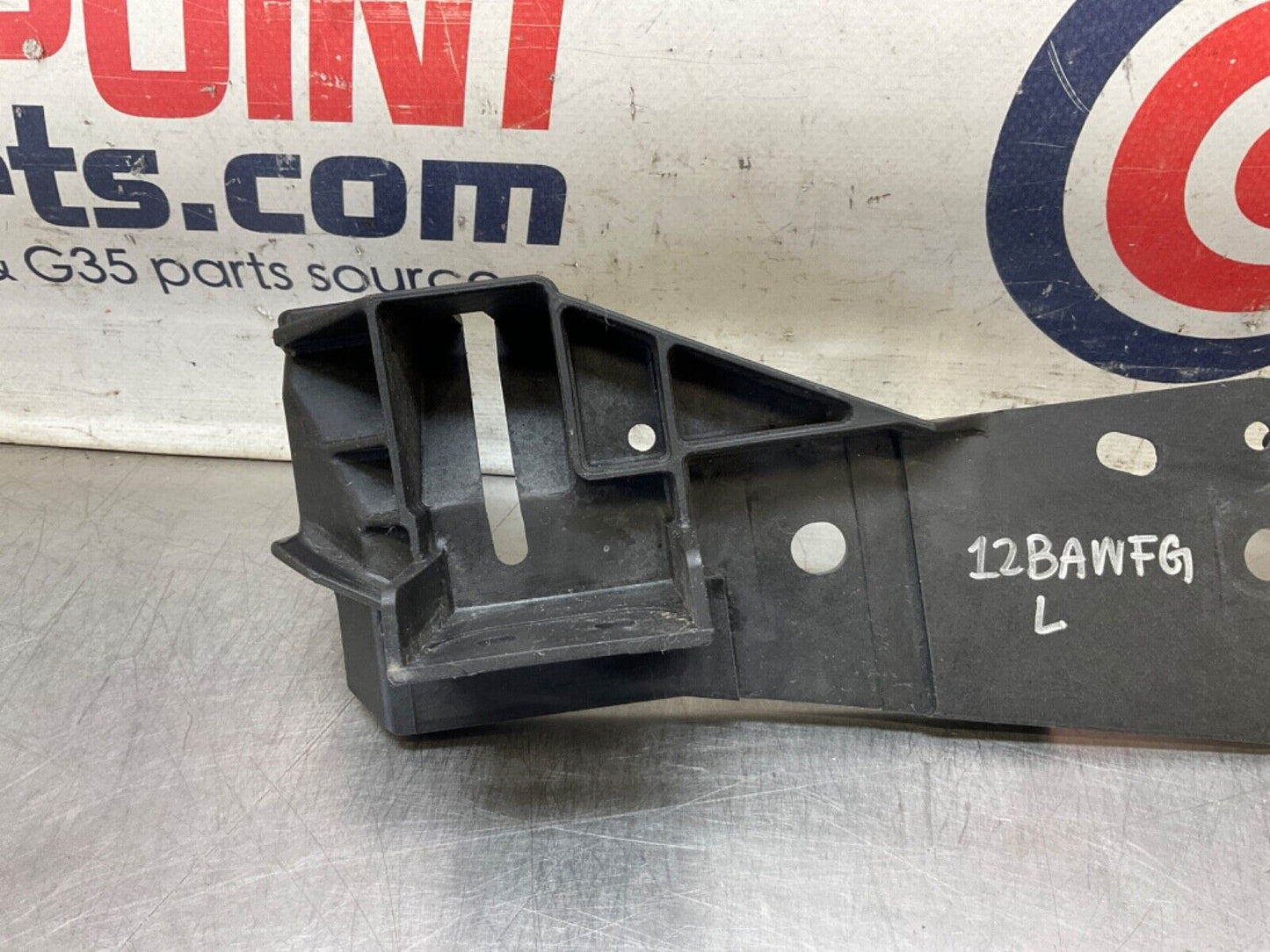 2009Infiniti V36 G37 Driver Left Radiator Support Headlight Bracket  OEM 12BAWFG - On Point Parts Inc