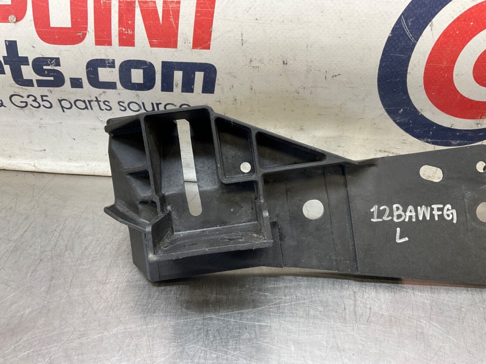 2009Infiniti V36 G37 Driver Left Radiator Support Headlight Bracket  OEM 12BAWFG - On Point Parts Inc