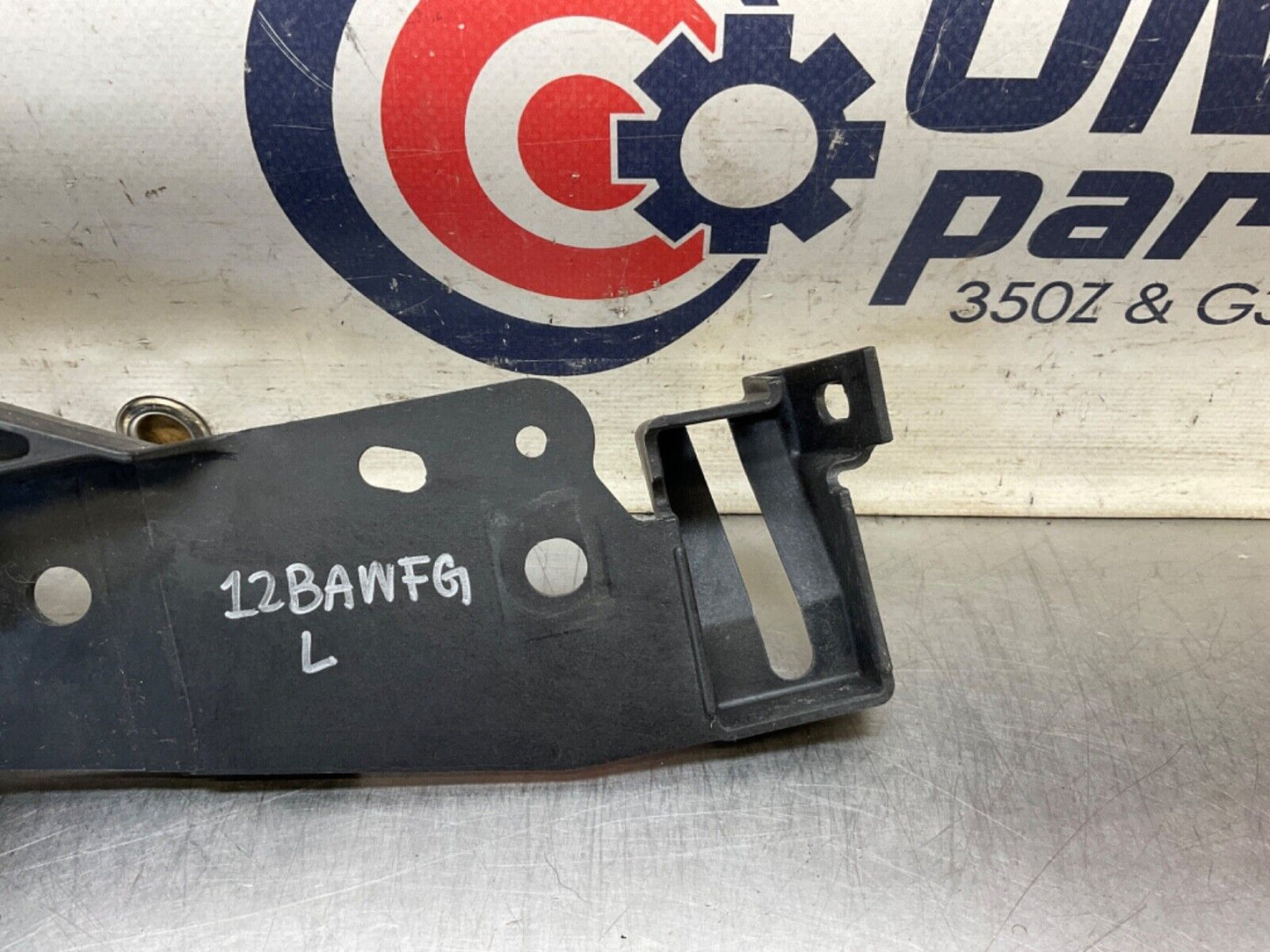 2009Infiniti V36 G37 Driver Left Radiator Support Headlight Bracket  OEM 12BAWFG - On Point Parts Inc