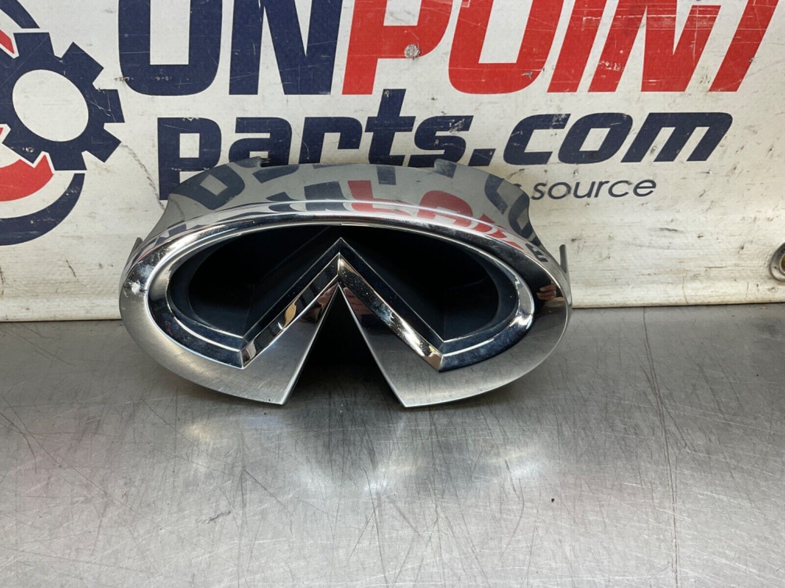 2009 Infiniti V36 G37 Front Grille Emblem  OEM 12BAWFC - On Point Parts Inc