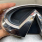 2009 Infiniti V36 G37 Front Grille Emblem  OEM 12BAWFC - On Point Parts Inc