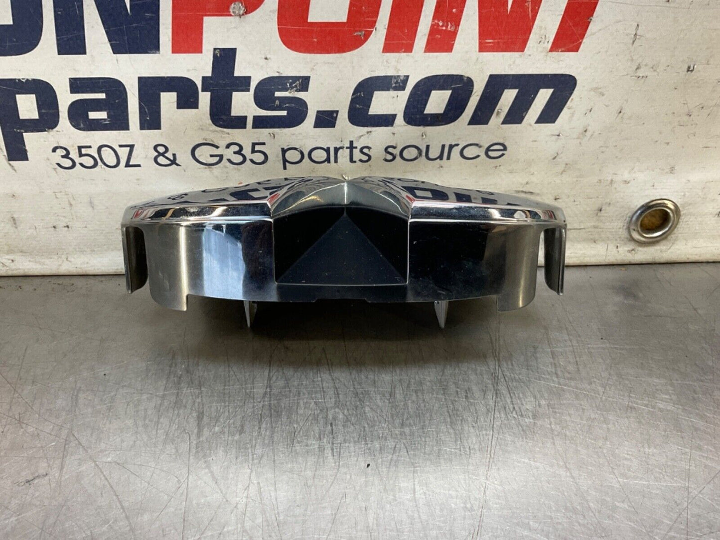 2009 Infiniti V36 G37 Front Grille Emblem  OEM 12BAWFC - On Point Parts Inc