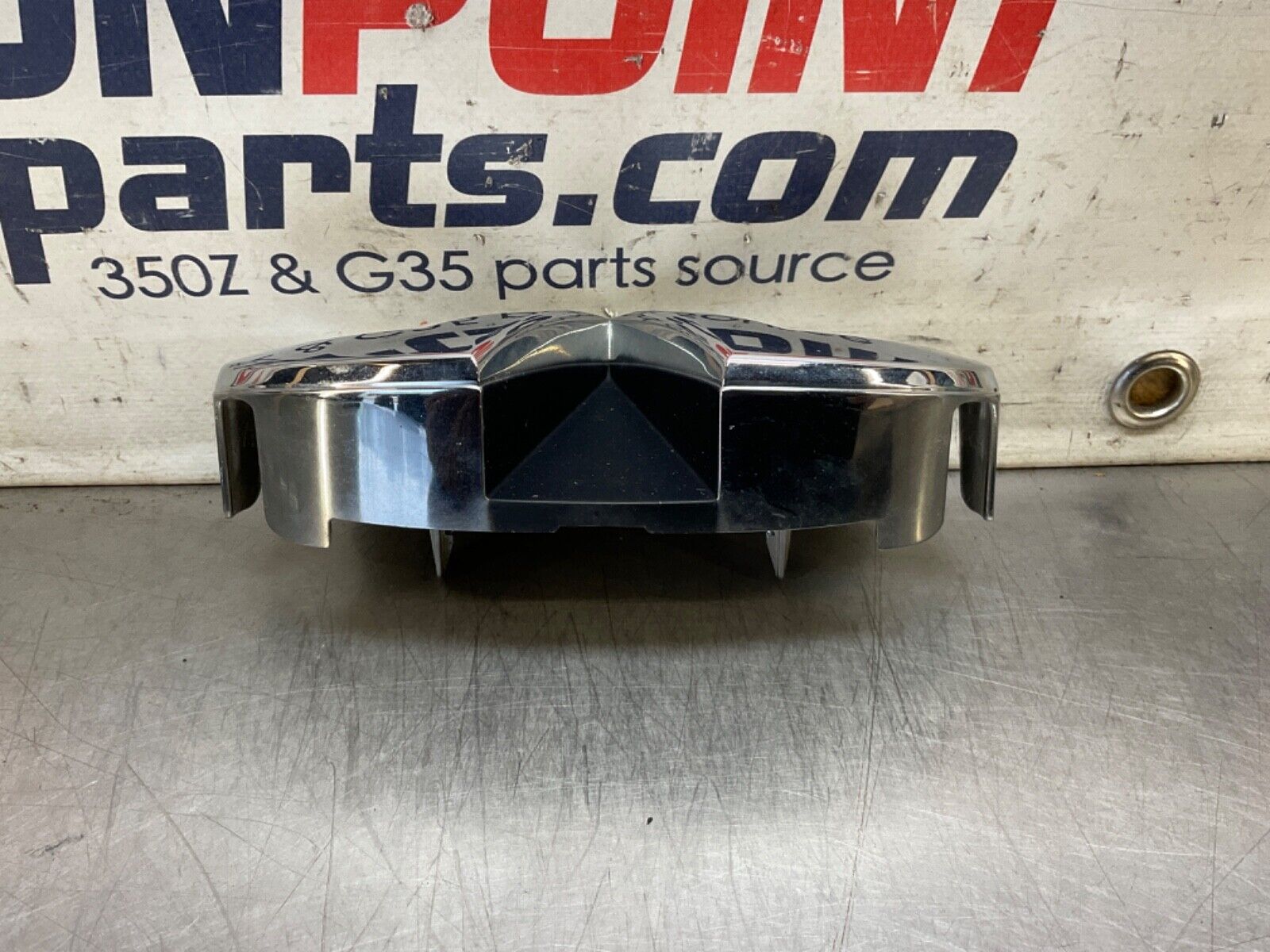 2009 Infiniti V36 G37 Front Grille Emblem  OEM 12BAWFC - On Point Parts Inc