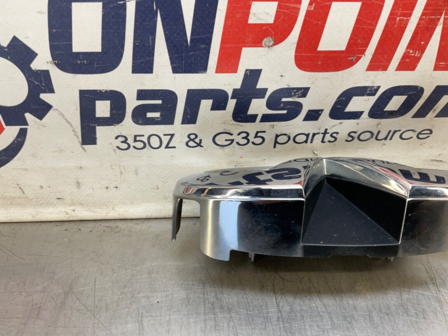 2009 Infiniti V36 G37 Front Grille Emblem  OEM 12BAWFC - On Point Parts Inc