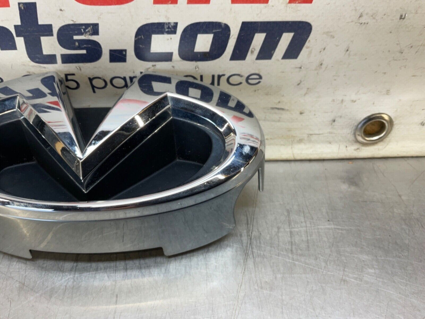 2009 Infiniti V36 G37 Front Grille Emblem  OEM 12BAWFC - On Point Parts Inc