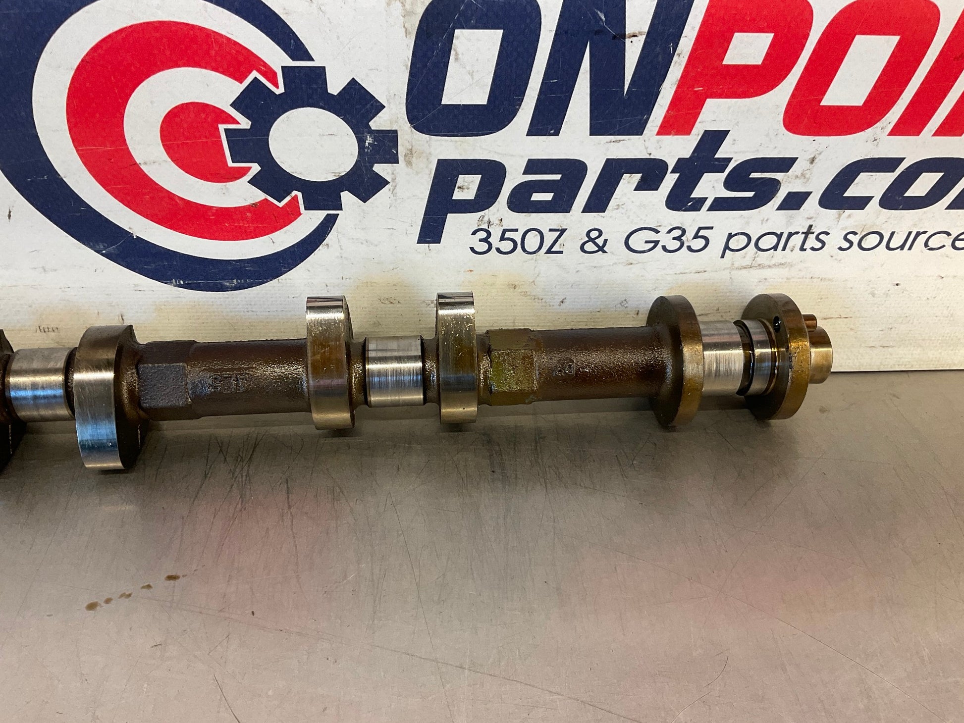 2014 Nissan 370Z Driver Left VQ37VHR Exhaust Cam Shaft and Sprocket OEM 23BDSD0 - On Point Parts Inc