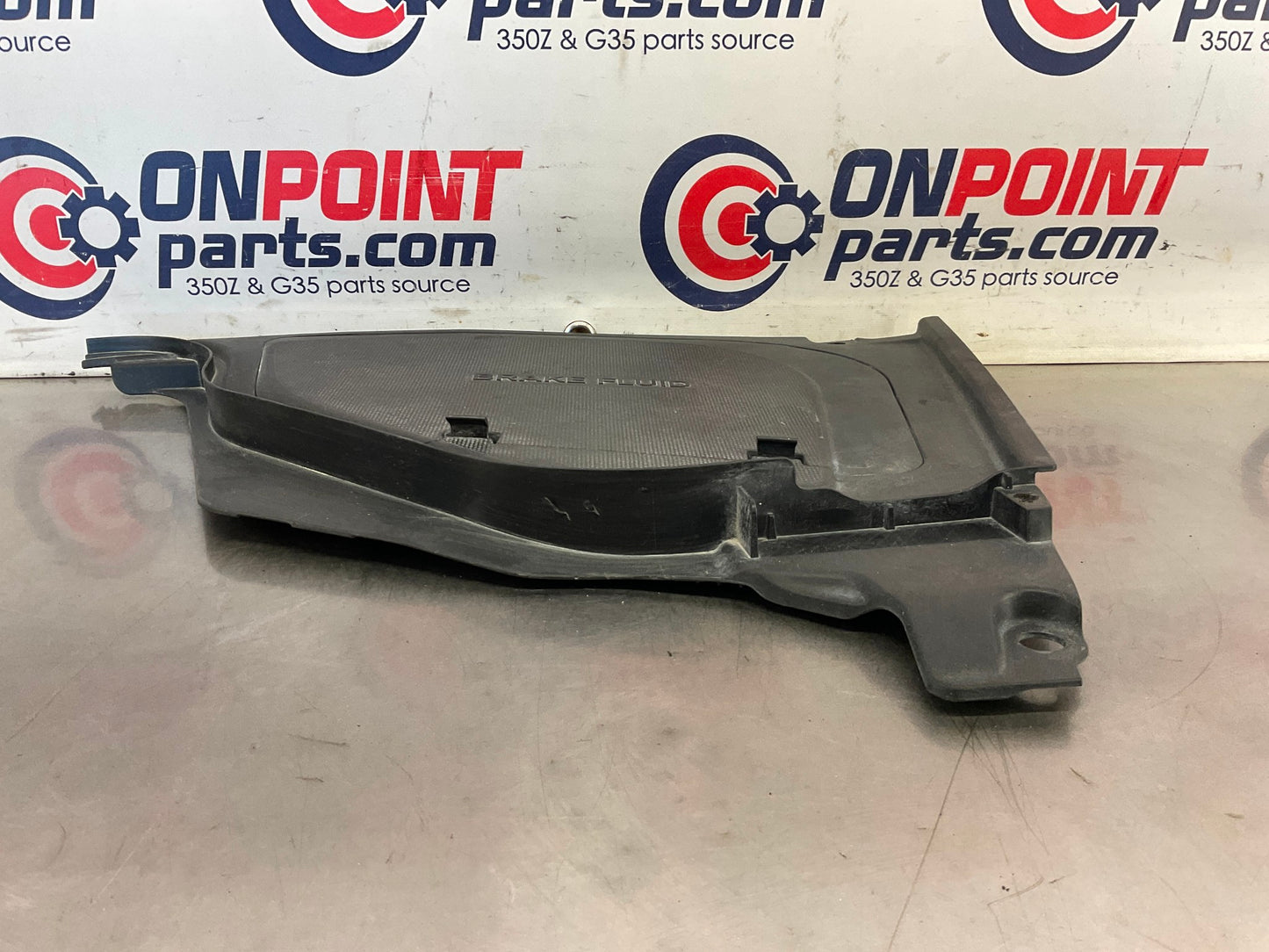 2012 Nissan 370Z Brake Fluid Bezel Trim Cover 64895 OEM 24BDME3 - On Point Parts Inc