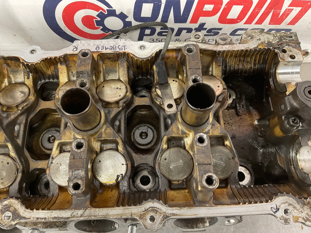 2004 Infiniti G35 VQ35DE Driver Left Cylinder Head with Crank Caps OEM 15BE4E0 - On Point Parts Inc