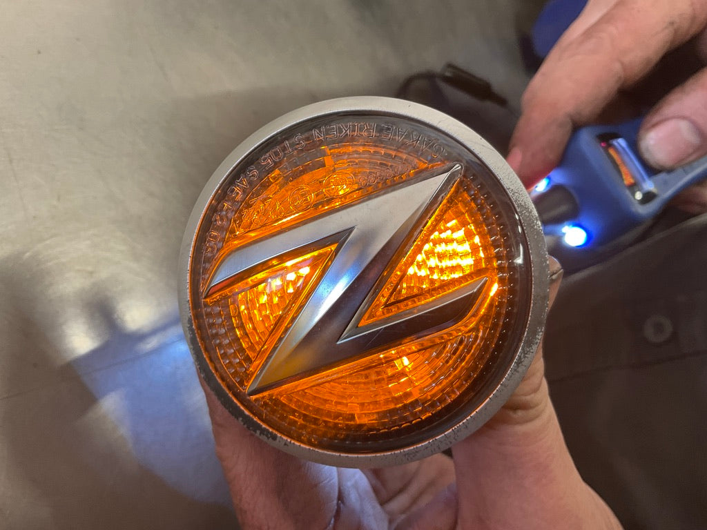 2010 Nissan 370Z Driver Left Illuminated Fender Emblem OEM 24BBBDA - On Point Parts Inc