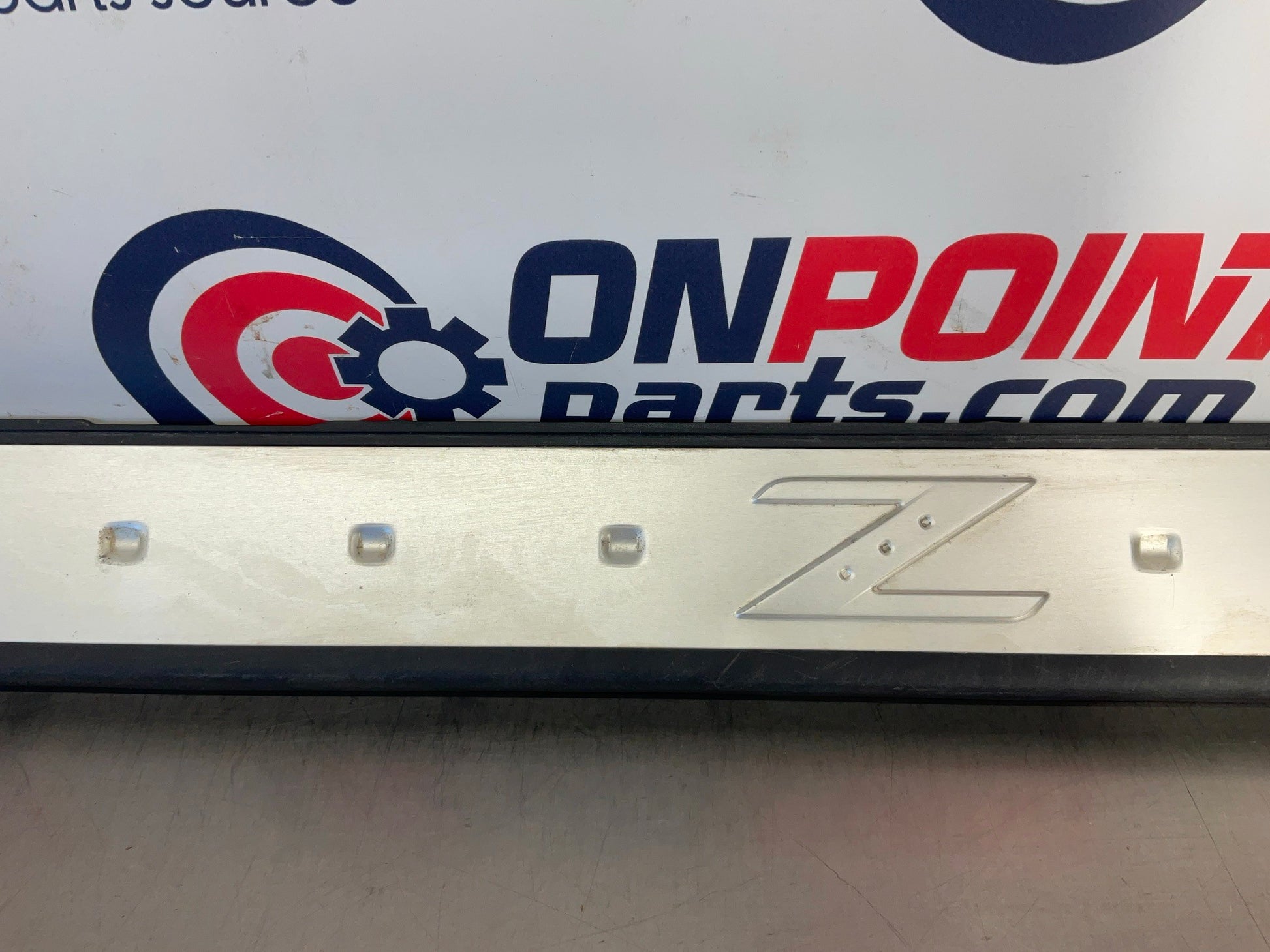 2006 Nissan 350Z Passenger Right Door Threshold Kick Plate Trim OEM 23BC9E7 - On Point Parts Inc