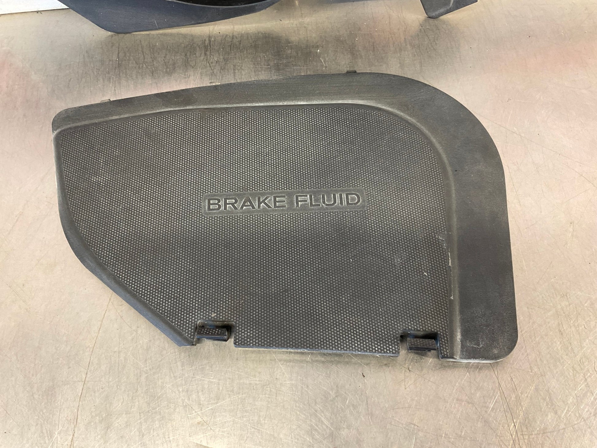 2012 Nissan 370Z Brake Fluid Bezel Trim Cover 64895 OEM 24BDME3 - On Point Parts Inc