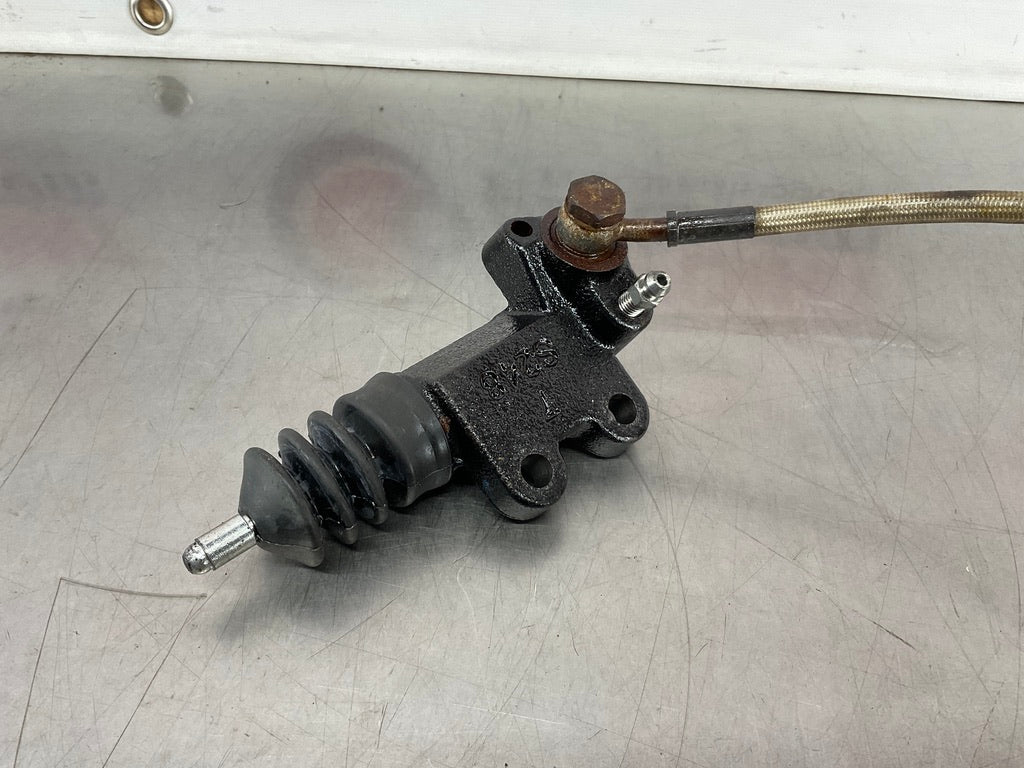 2006 Nissan 350Z Clutch Slave Cylinder with Braided Steel Line OEM 15BAJDG - On Point Parts Inc