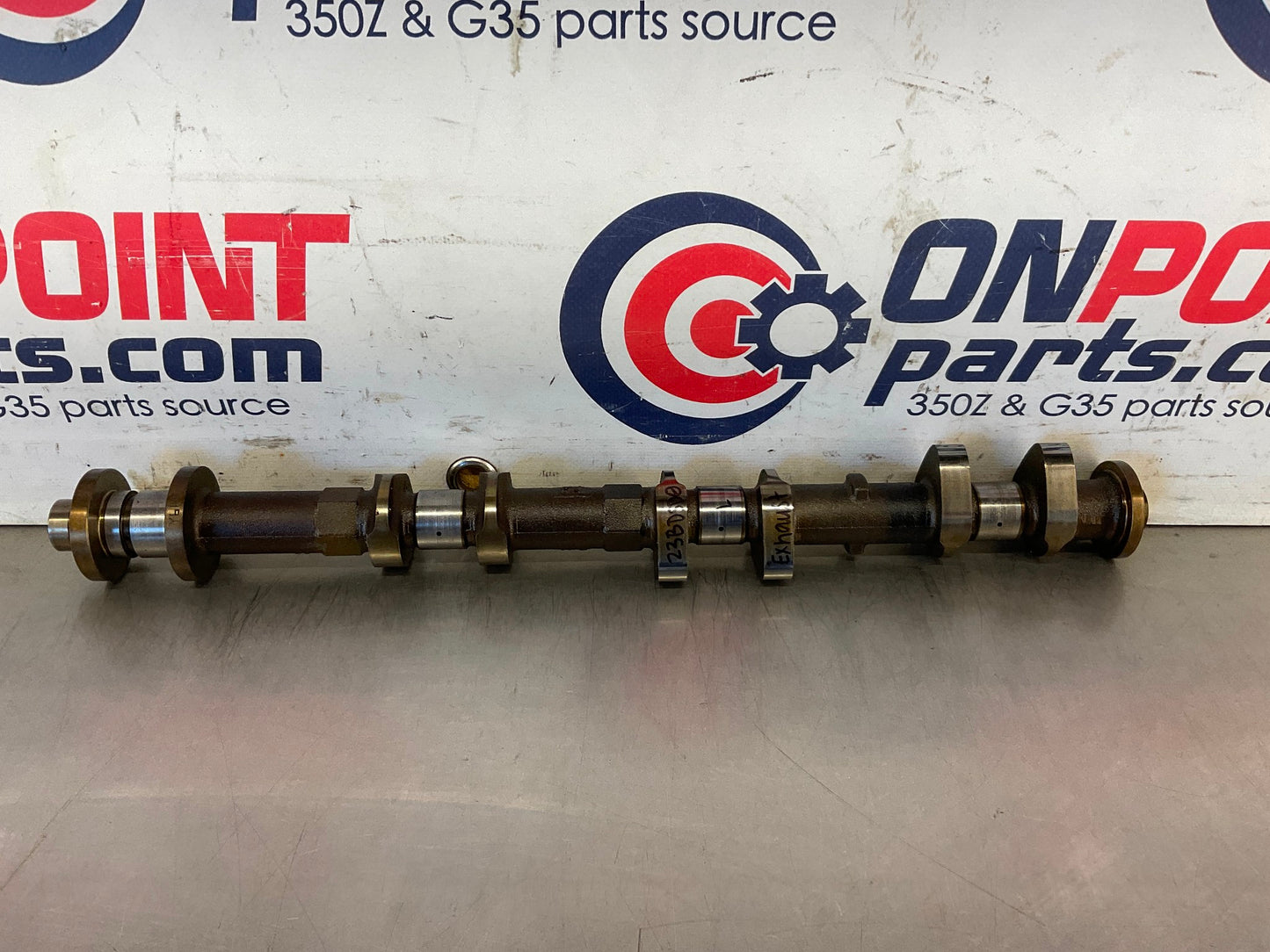 2014 Nissan 370Z Driver Left VQ37VHR Exhaust Cam Shaft and Sprocket OEM 23BDSD0 - On Point Parts Inc