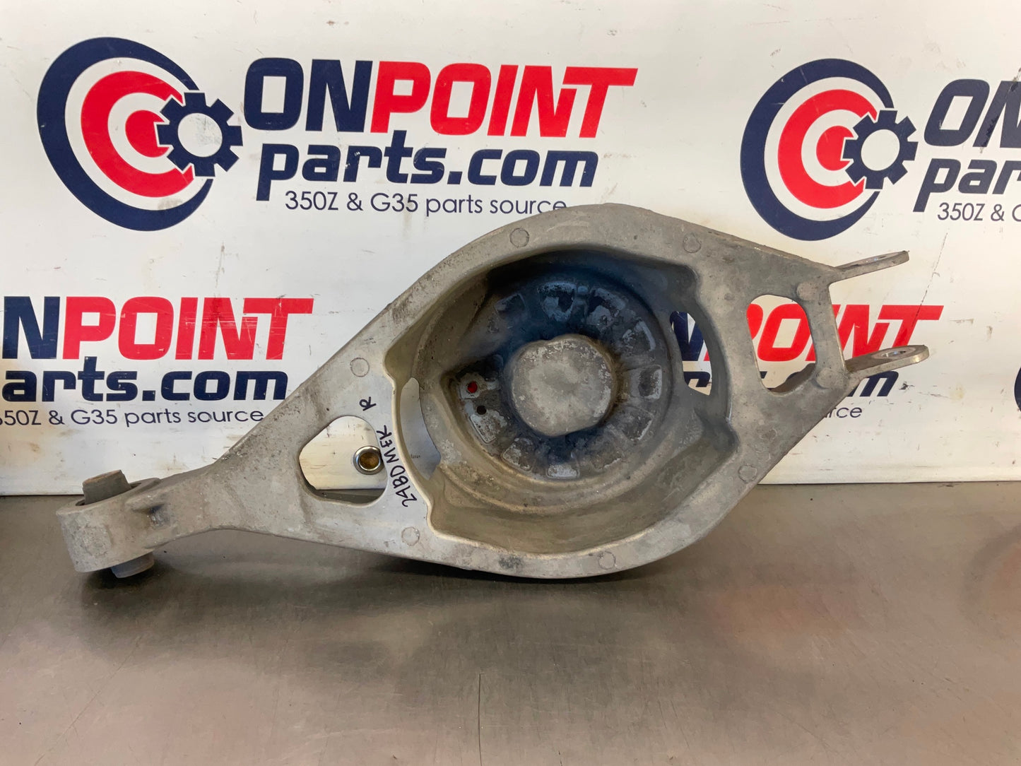 2012 Nissan 370Z Passenger Right Rear Coil Spring Bucket OEM 24BDMEK - On Point Parts Inc