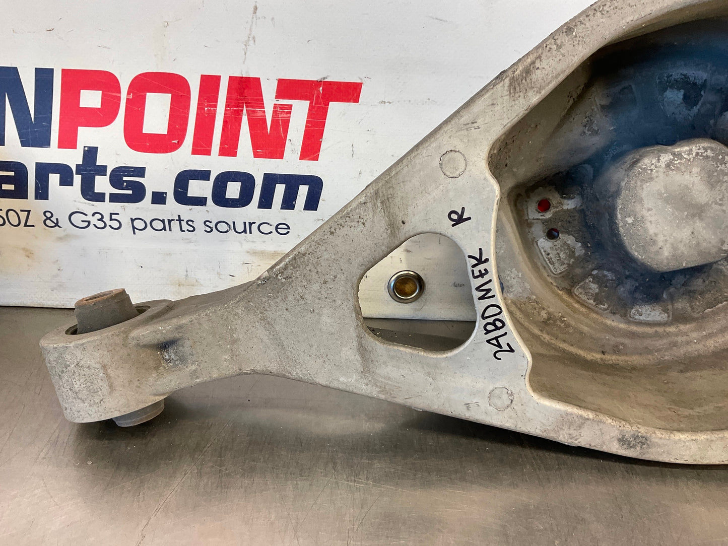 2012 Nissan 370Z Passenger Right Rear Coil Spring Bucket OEM 24BDMEK - On Point Parts Inc