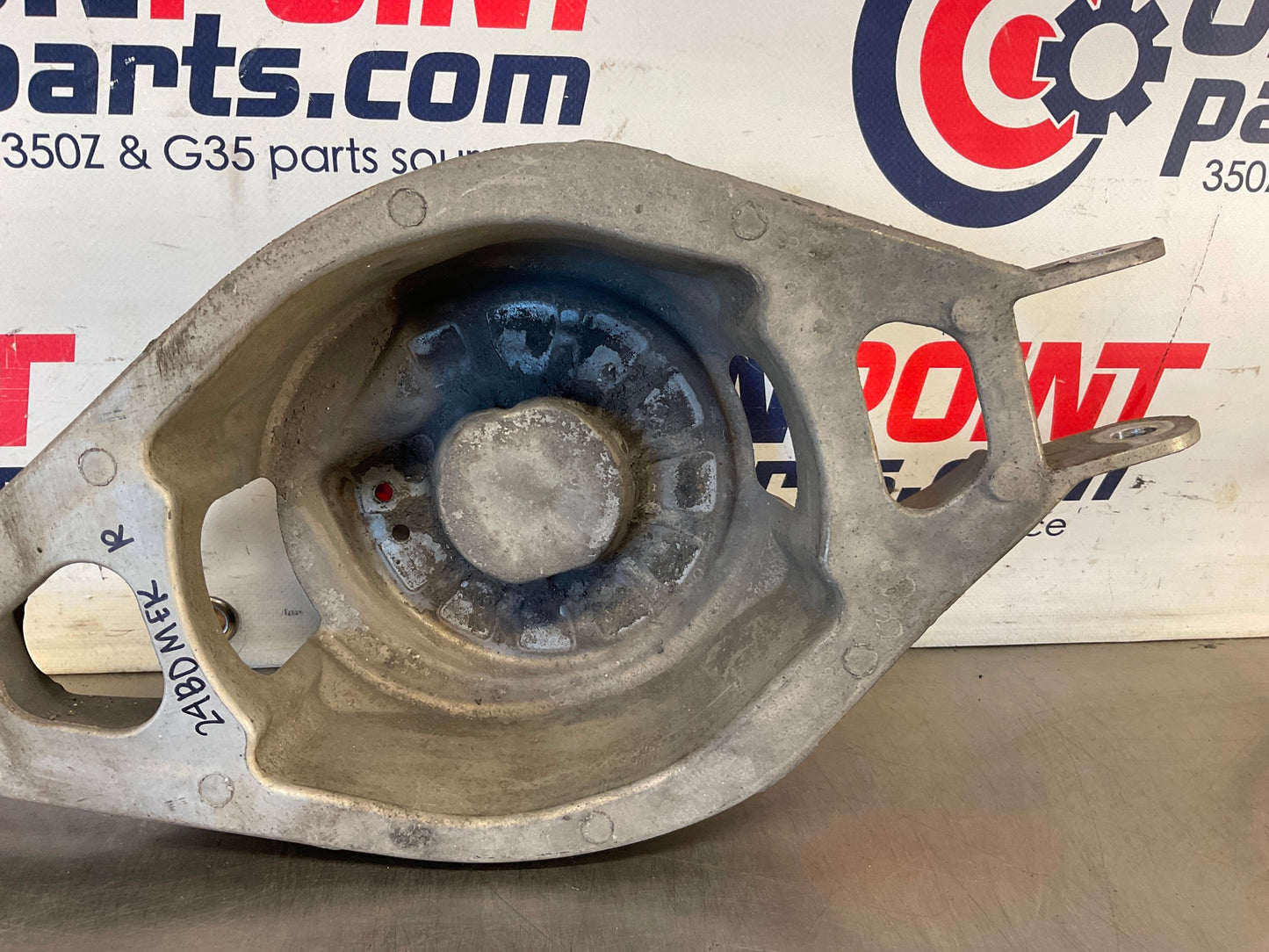 2012 Nissan 370Z Passenger Right Rear Coil Spring Bucket OEM 24BDMEK - On Point Parts Inc