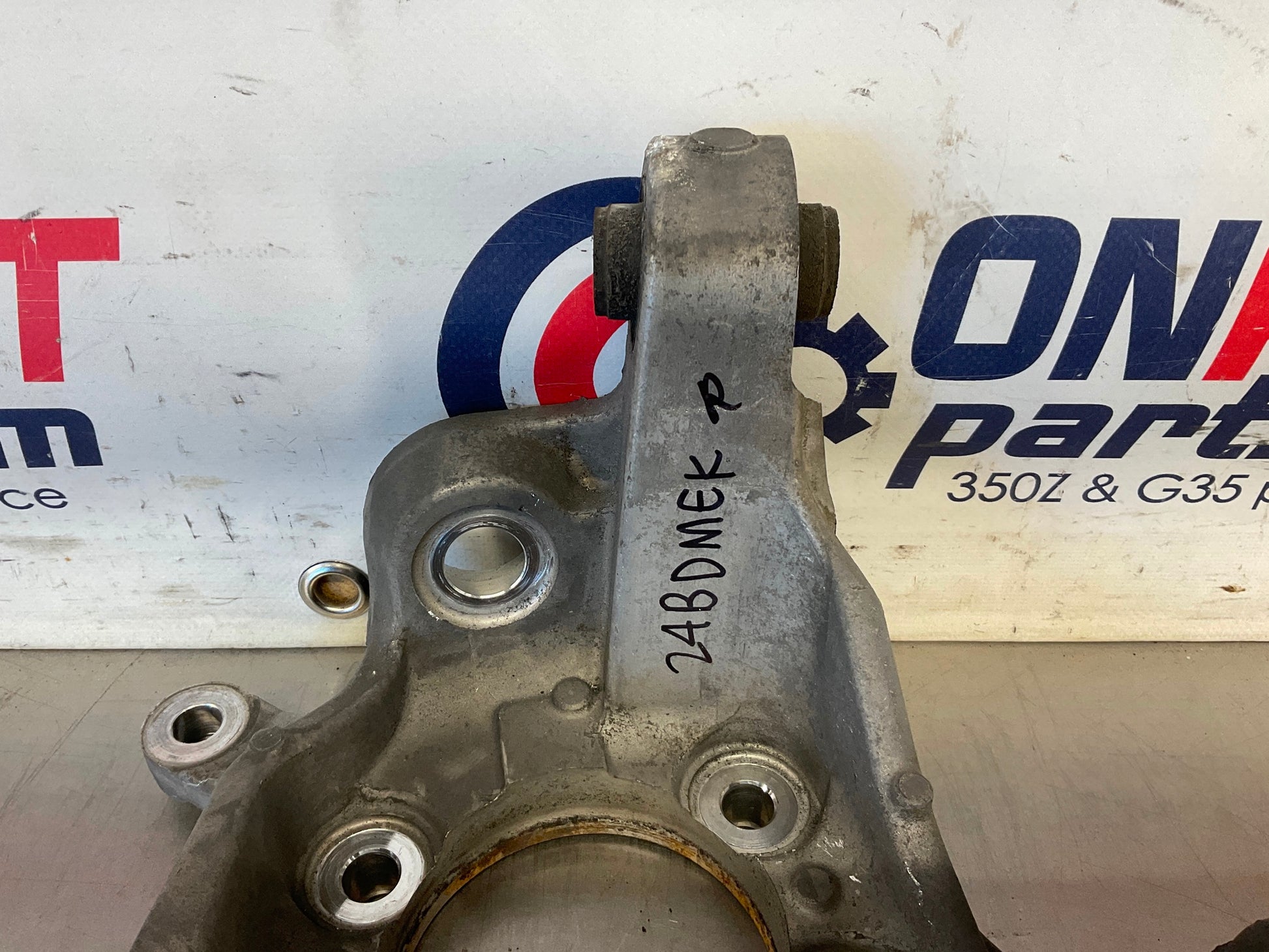 2012 Nissan 370Z Passenger Right Rear Suspension Knuckle OEM 24BDMEK - On Point Parts Inc