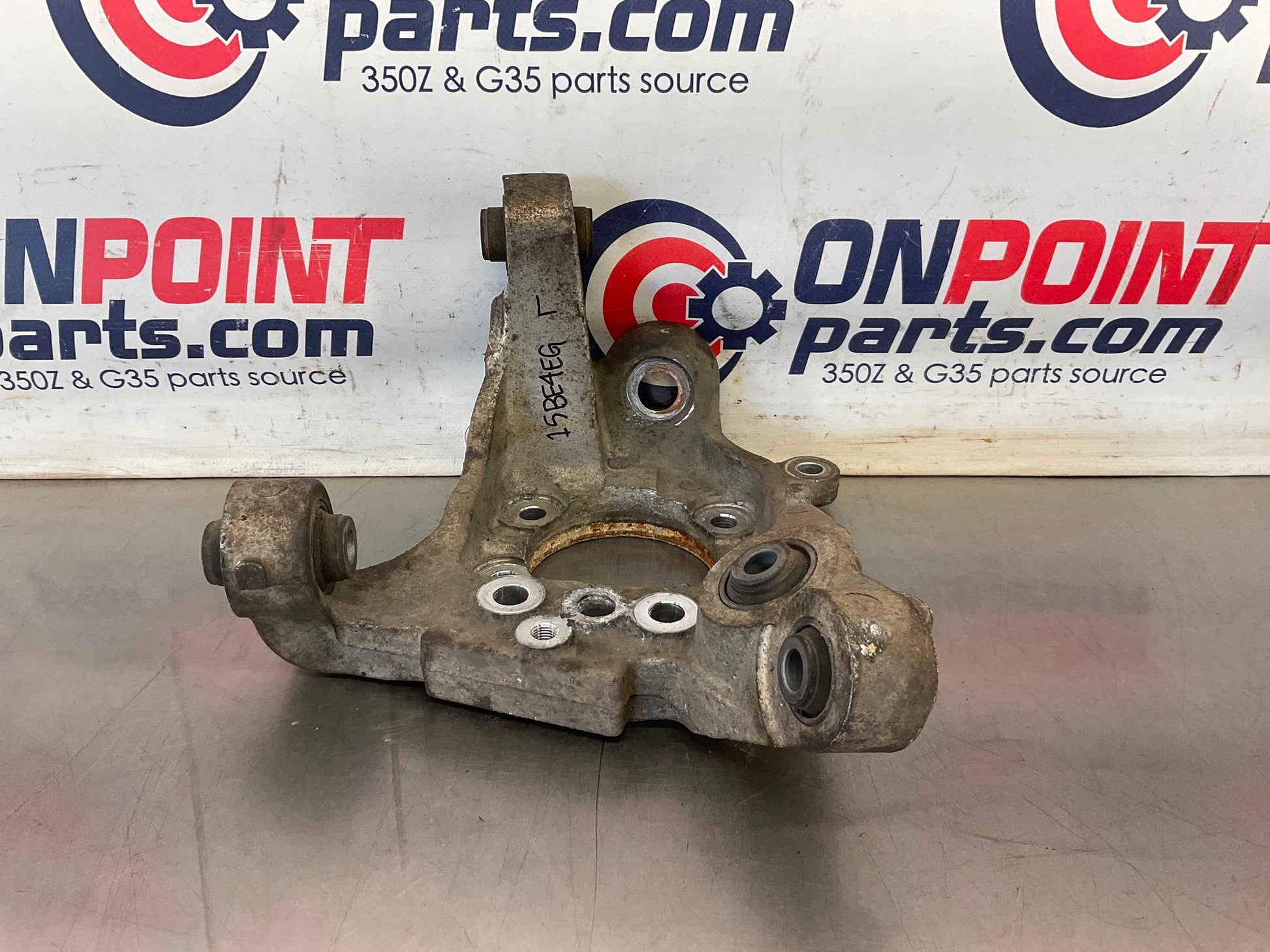 2004 Infiniti G35 Driver Left Rear Suspension Knuckle Axle Housing OEM 15BE4EG - On Point Parts Inc